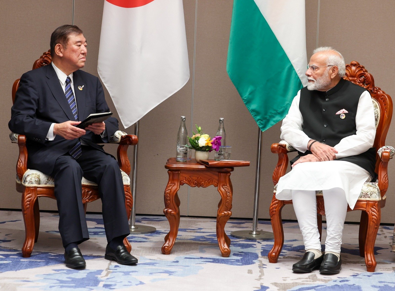 Prime Minister Narendra Modi of India and Prime Minister Shigeru Ishiba of Japan confer on the sidelines of the India–ASEAN Summit in Lao PDR. Credit: PMO India