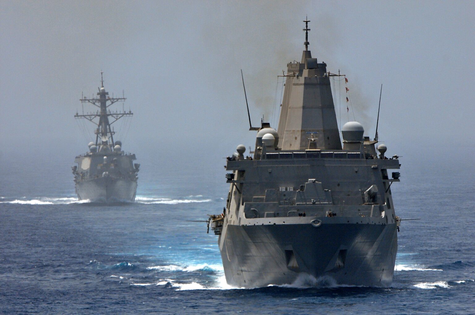 U.S. Navy vessels patrolling the Strait of Hormuz during a period of heightened geopolitical tension.